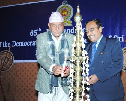 Chief_Guest_Hon._Yadhu_Bansh_Jha_lighting_the_oil_lamp_with_the_participation_of_H.E._the_Ambassador