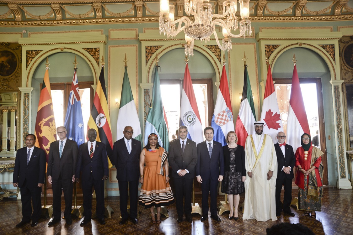Photo 2 - Ambassador Jaffeer with President Benitez and group of Ambassadors